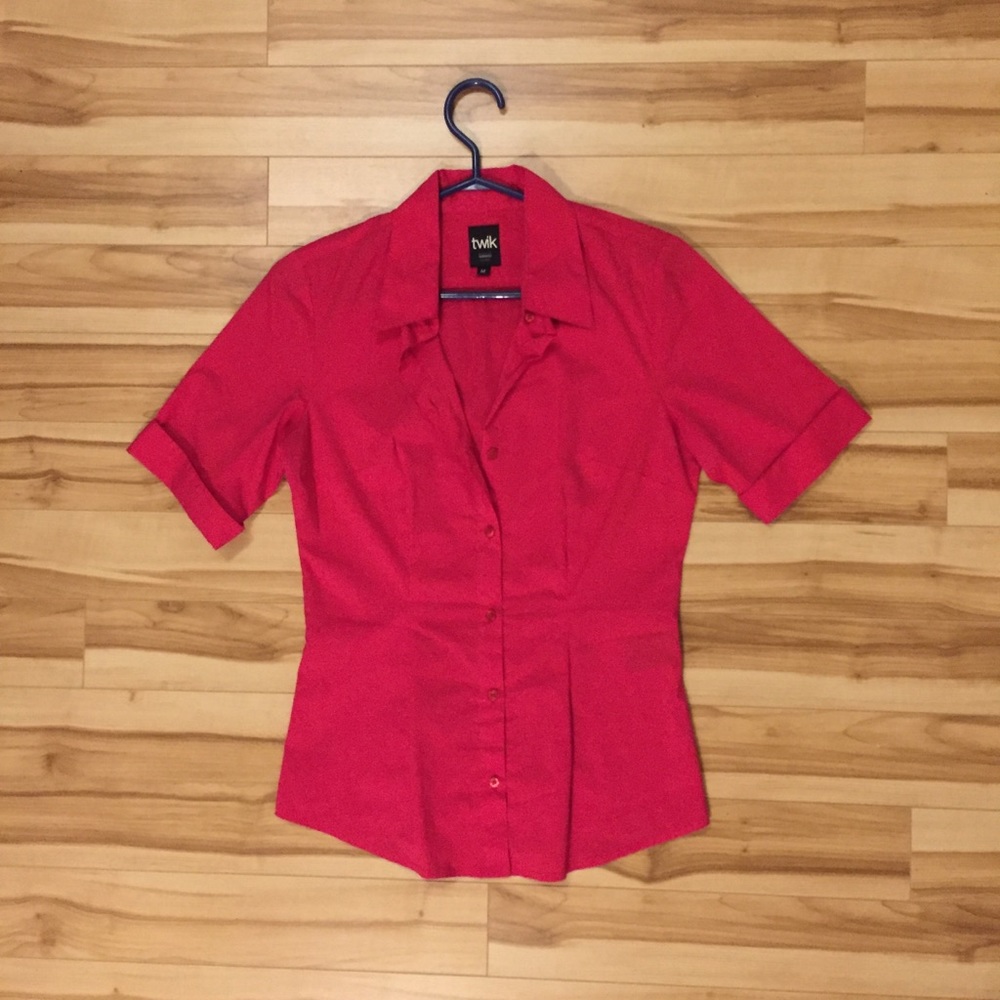 Hot pink magenta short sleeve button up collared top